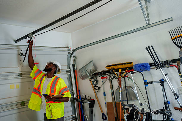 Professional Garage Door Panel Replacement technician working in Hallstead, PA