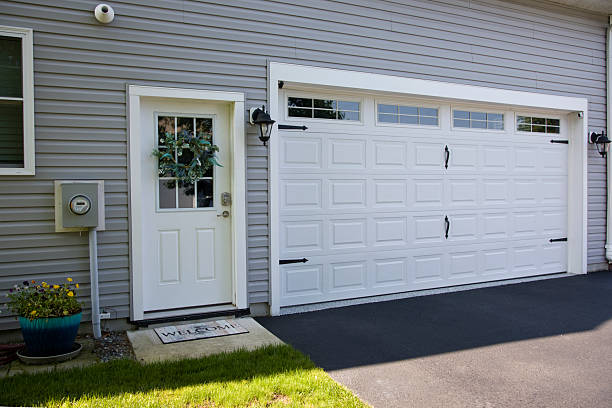24/7 Emergency Garage Door Panel Replacement experts in Hallstead, PA